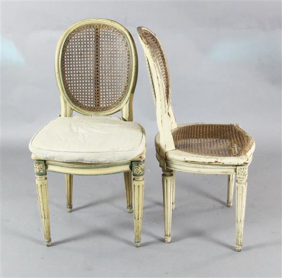 A set of 5 Louis XVI style cream painted and caned side chairs H. 3ft.